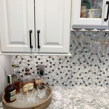 Open Concept Remodel in Rock Island With Walls Removed and a Custom Entry Bench