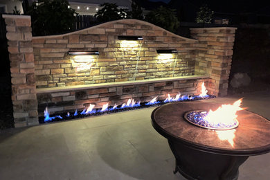 Design ideas for a large craftsman full sun backyard landscaping in Other for summer.