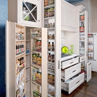 Mid-sized transitional kitchen pantry ideas - Inspiration for a mid-sized transitional dark wood floor kitchen pantry remodel in Tampa with shaker cabinets, white cabinets, marble countertops, white backsplash and stone slab backsplash