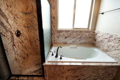 Example of a transitional bathroom design in Denver