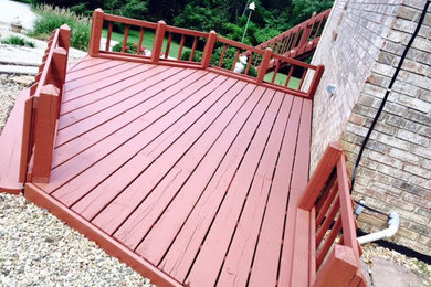 Inspiration for a mid-sized modern backyard deck remodel in Indianapolis with no cover