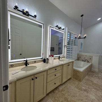 Curd-less walk-in shower; heated floors in bathroom + shower+bench LED