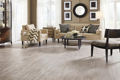 Inspiration for a large transitional formal and open concept light wood floor living room remodel in Salt Lake City with brown walls, no fireplace and no tv