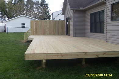 Deck - large backyard deck idea in Cleveland with no cover