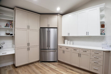 Kitchen - mid-sized modern kitchen idea in San Diego with beige cabinets