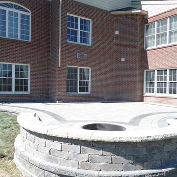 Raised Patio made with Unilock's Pisa Wall, Brussels and lL Campo Pavers