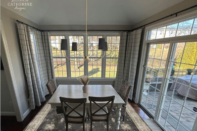 Example of a mid-sized transitional dining room design in Philadelphia