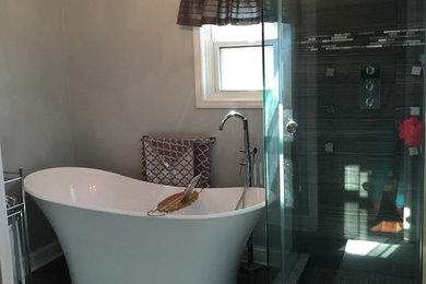 Bathroom - large contemporary master gray tile and porcelain tile bathroom idea in Louisville with shaker cabinets, dark wood cabinets and granite countertops