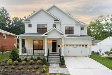 Example of a large three-story exterior home design in DC Metro