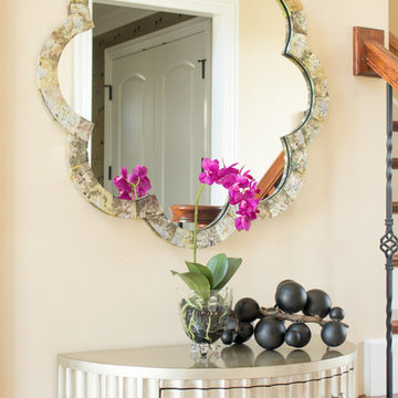 Wrought Iron Staircase Railing Entryway with Nearly Natural Phalaenopsis Arrange