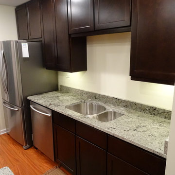 Espresso Cabinets with Romano Dream Granite Countertops