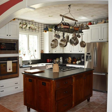 Kitchen Remodel with White Maple Cabinets & Black Pearl Leather Granite Tops