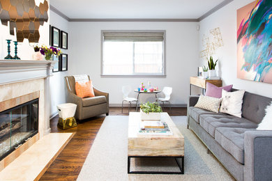 Inspiration for a mid-sized transitional formal and open concept medium tone wood floor and brown floor living room remodel in San Francisco with a standard fireplace, a tile fireplace, no tv and white walls