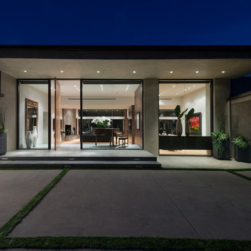 Wallace Ridge Beverly Hills modern luxury home front entrance pivot door & glass