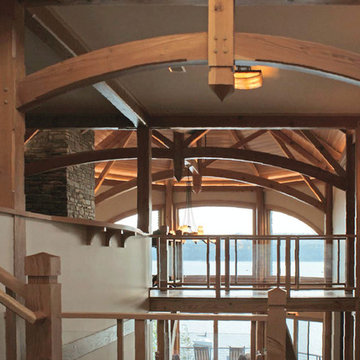 Arched Trusses and Windows of Shingle-Style Lake Home