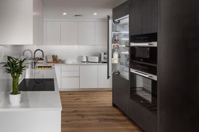Kitchen - contemporary kitchen idea in Other