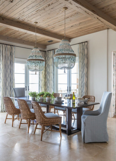 Beach Style Dining Room by Aria Homes, Inc.