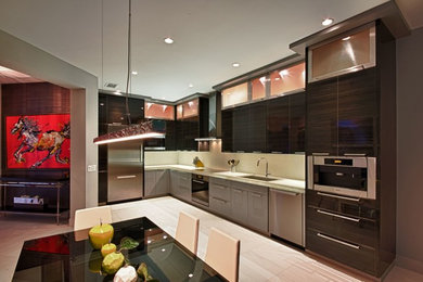 Photo of a contemporary home design in Miami.