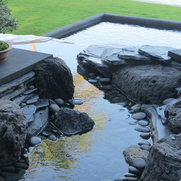 Water Features stream into pool Manalapan, Florida