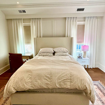 Pinch Pleat Drapery Side Panels Over Linen Roman Shades in Master Bedroom