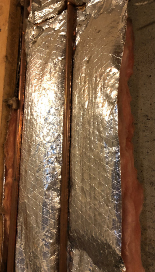 Copper pipe with no batt insulation behind it?