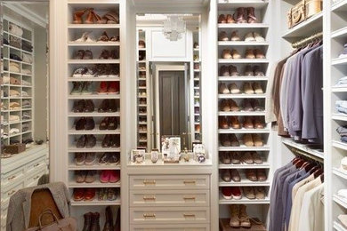 Dressing room - large transitional gender-neutral dressing room idea in Baltimore with white cabinets