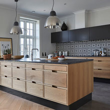 Kitchen Cupboards In Both Black And Wood
