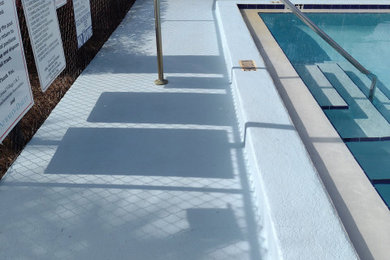 Inspiration for a large coastal courtyard concrete and rectangular lap pool remodel in Jacksonville