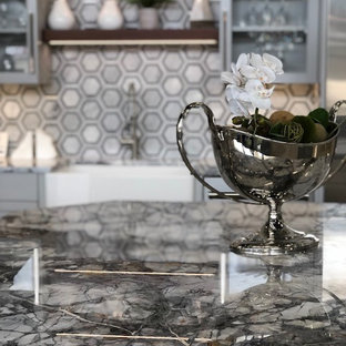 Mid-sized contemporary kitchen pantry designs - Kitchen pantry - mid-sized contemporary l-shaped light wood floor and beige floor kitchen pantry idea in Richmond with a farmhouse sink, recessed-panel cabinets, white cabinets, marble countertops, gray backsplash, mosaic tile backsplash, stainless steel appliances and an island