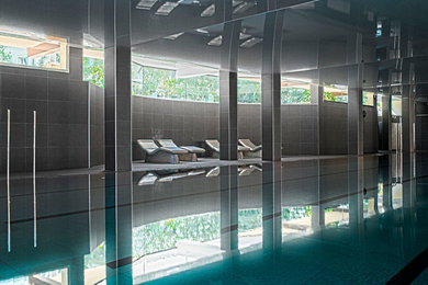 Design ideas for a modern swimming pool in Other.