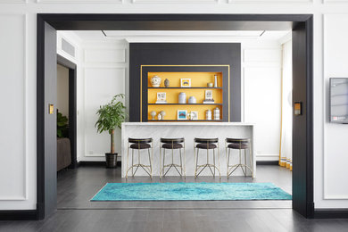 Home bar - traditional dark wood floor and black floor home bar idea in Other with open cabinets, dark wood cabinets, marble countertops and white countertops