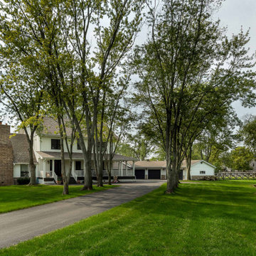 Elegant Country Homestead with Tree-Lined Drive & Barn
