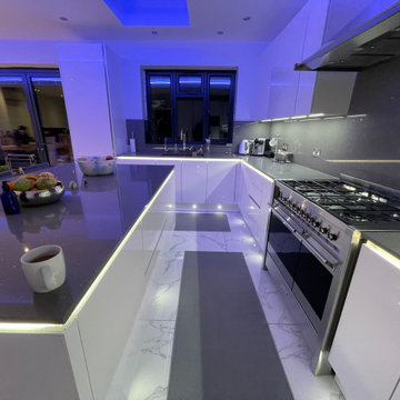 Hacker German made kitchen in white gloss handleless with channel