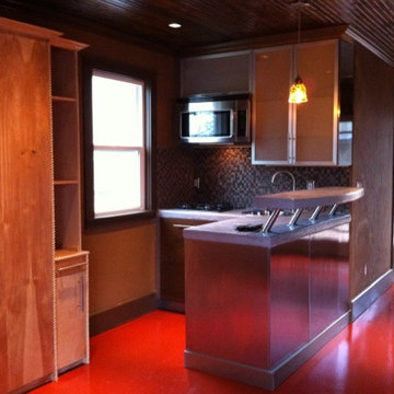 2-car garage converted into a swanky studio apartment with a Murphy bed