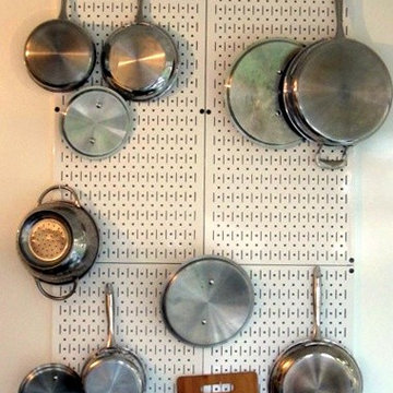 Wall Control pegboard tool board holding pots and pans | Kitchen Pegboard | Pint