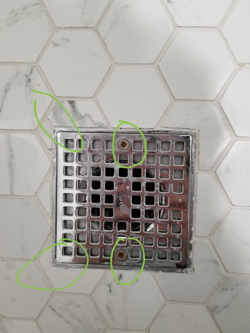 Chipped Mosaic Tiles Around Shower, How To Tile Around A Drain In Shower
