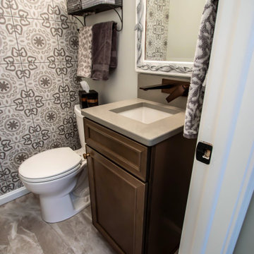 Maple Stained Shaker Wet Bar with Matching Tile in Powder Room