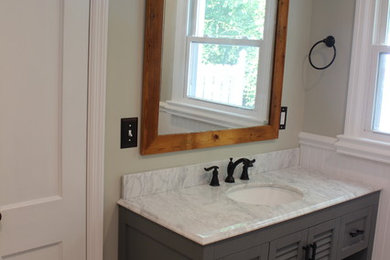Example of a transitional bathroom design in Raleigh