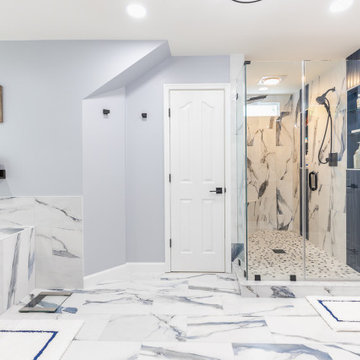 Bathroom remodeling in Columbia, MD with double vanity & marble bathtub