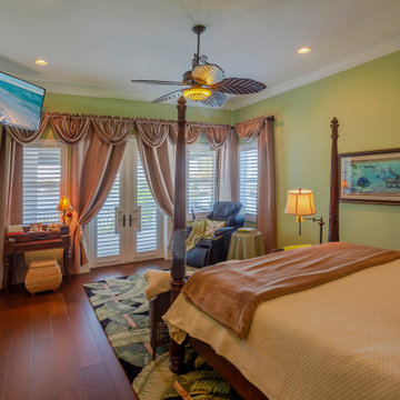 Luxury Master Bedroom With Designer Touches And Cozy Seating