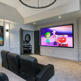 Design ideas for a traditional home cinema in Toronto with grey walls, carpet and a projector screen.