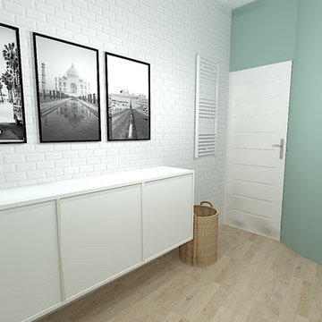 Une salle de bain vert et blanche