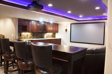 Inspiration for a mid-sized timeless carpeted home theater remodel in Milwaukee with beige walls