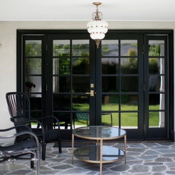 Covered Patio with Black French Doors
