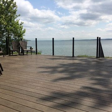 Wrap Around Composite Deck w/ Aluminum Frame-less Glass Railing in Seba Beach