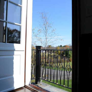 Blackened Bronze Balcony Railing with Medallions and Scrolls