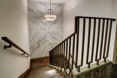 Staircase - mid-sized contemporary wooden straight staircase idea in Houston with wooden risers
