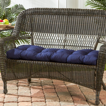 Wicker Loveseat with a Deep Navy Cushion