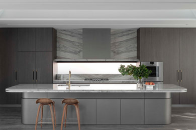 Inspiration for an expansive contemporary galley open plan kitchen in Sydney with flat-panel cabinets, with island, a double-bowl sink, dark wood cabinets, marble benchtops, multi-coloured splashback, glass sheet splashback, stainless steel appliances, medium hardwood floors, brown floor, multi-coloured benchtop and vaulted.