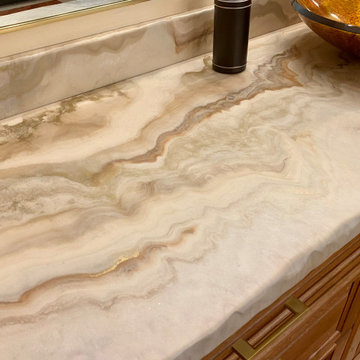 Yellow Onyx Epoxy Countertops with Hammered Copper Tub Surround